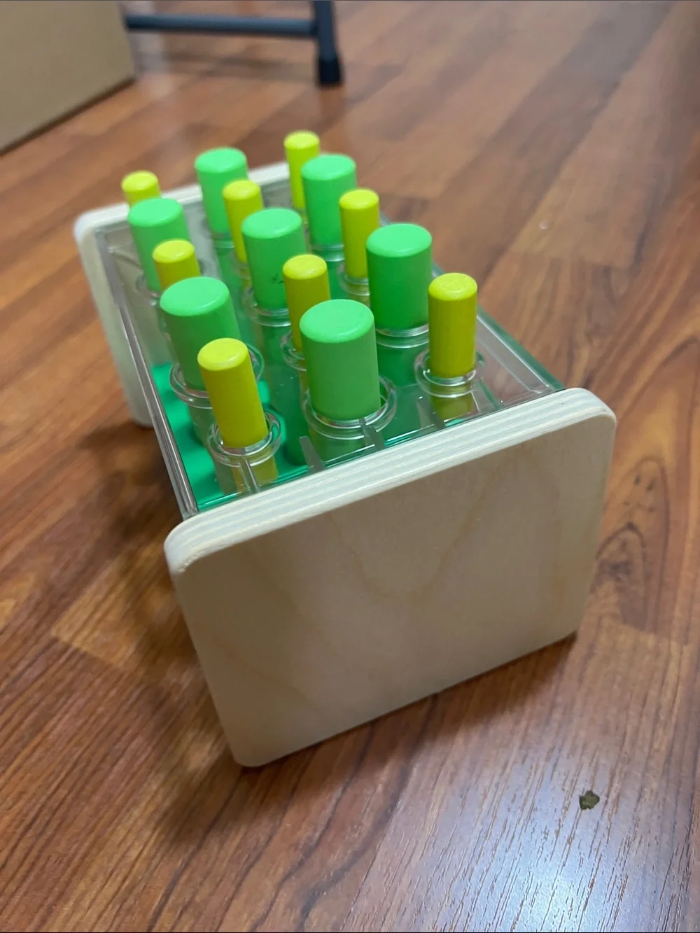 Lovevery Wooden Posting Stand Educational Toy Green and Yellow